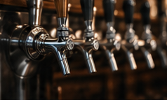 Row of commercial draft faucets